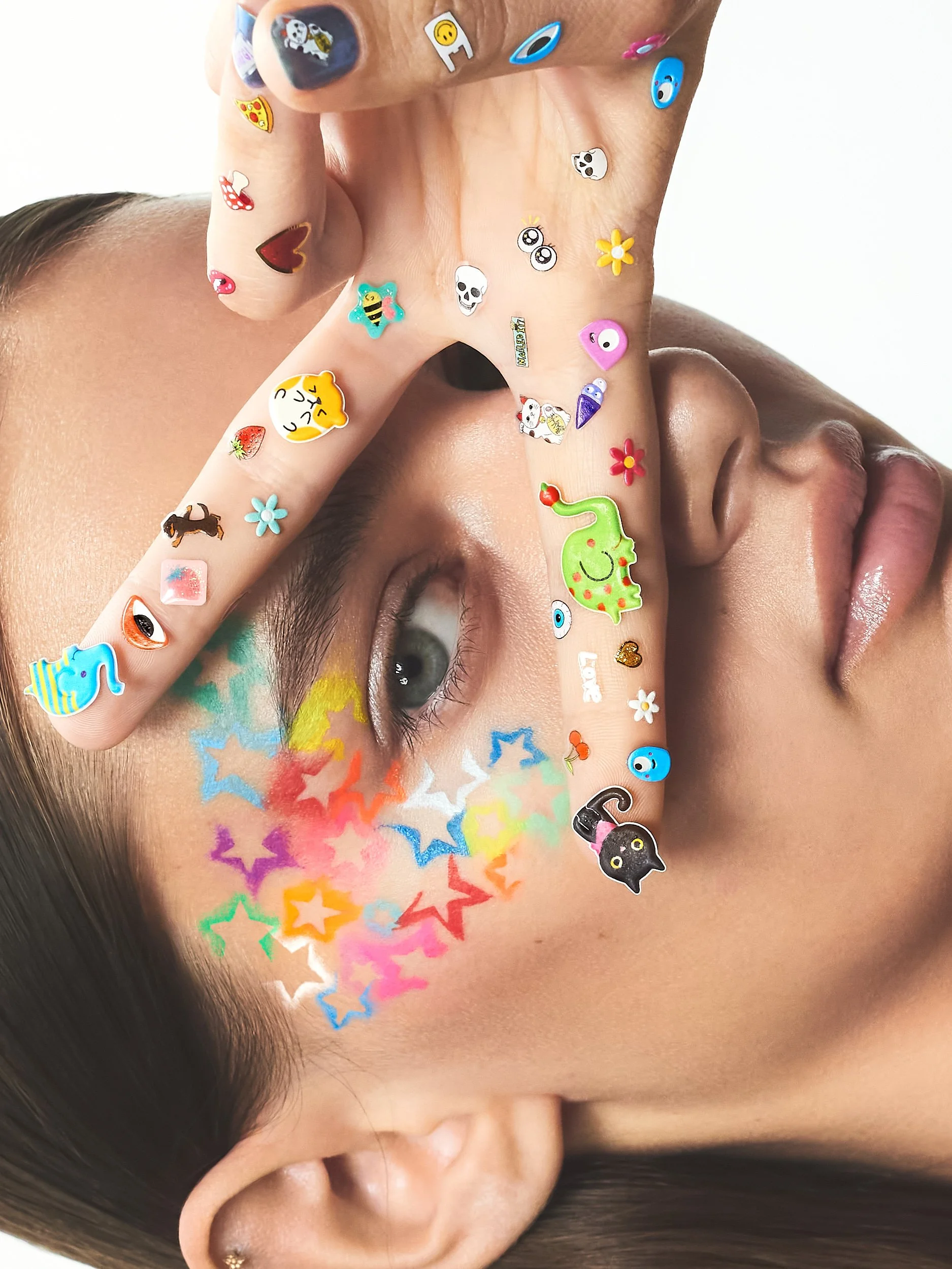 joshua-pestka-nail-beauty-editorial-sticker-hand-star-makeup.jpg