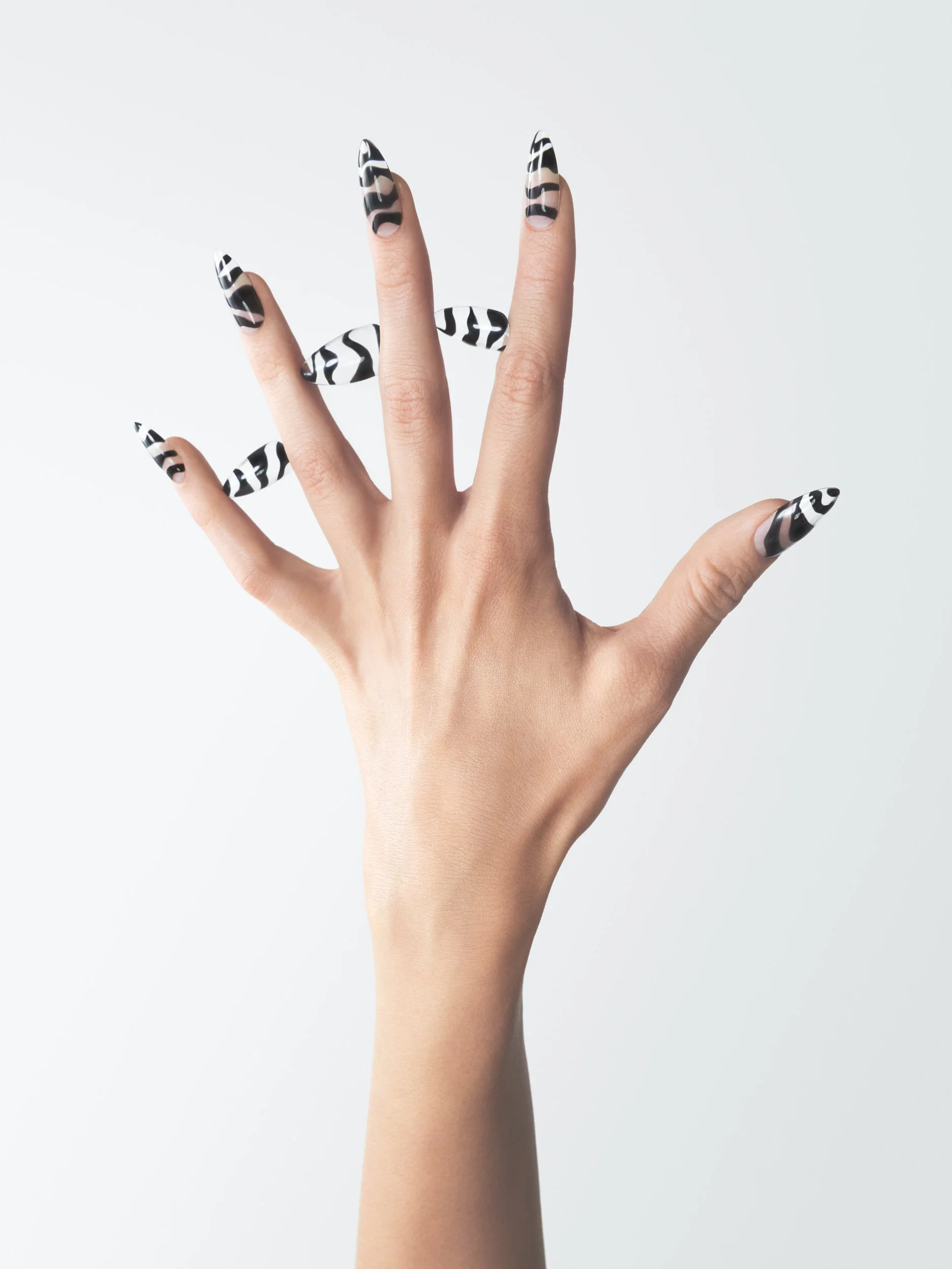 joshua-pestka-nail-beauty-editorial-zebra-print-nails-hand.jpg