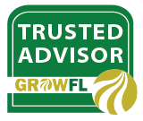 Logo with green background, white text reading 'Trusted Advisor,' and a gold and white stylized golf ball with turf design labeled 'GROWFL'.