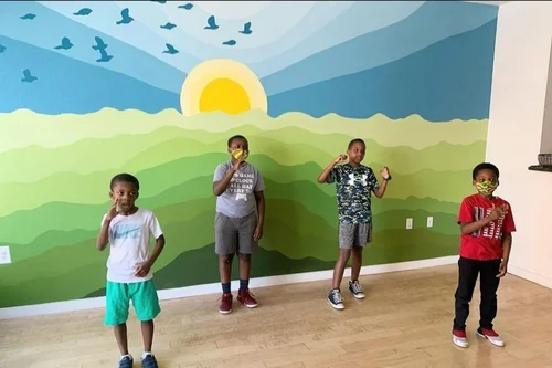 Kids at the TRAC mural