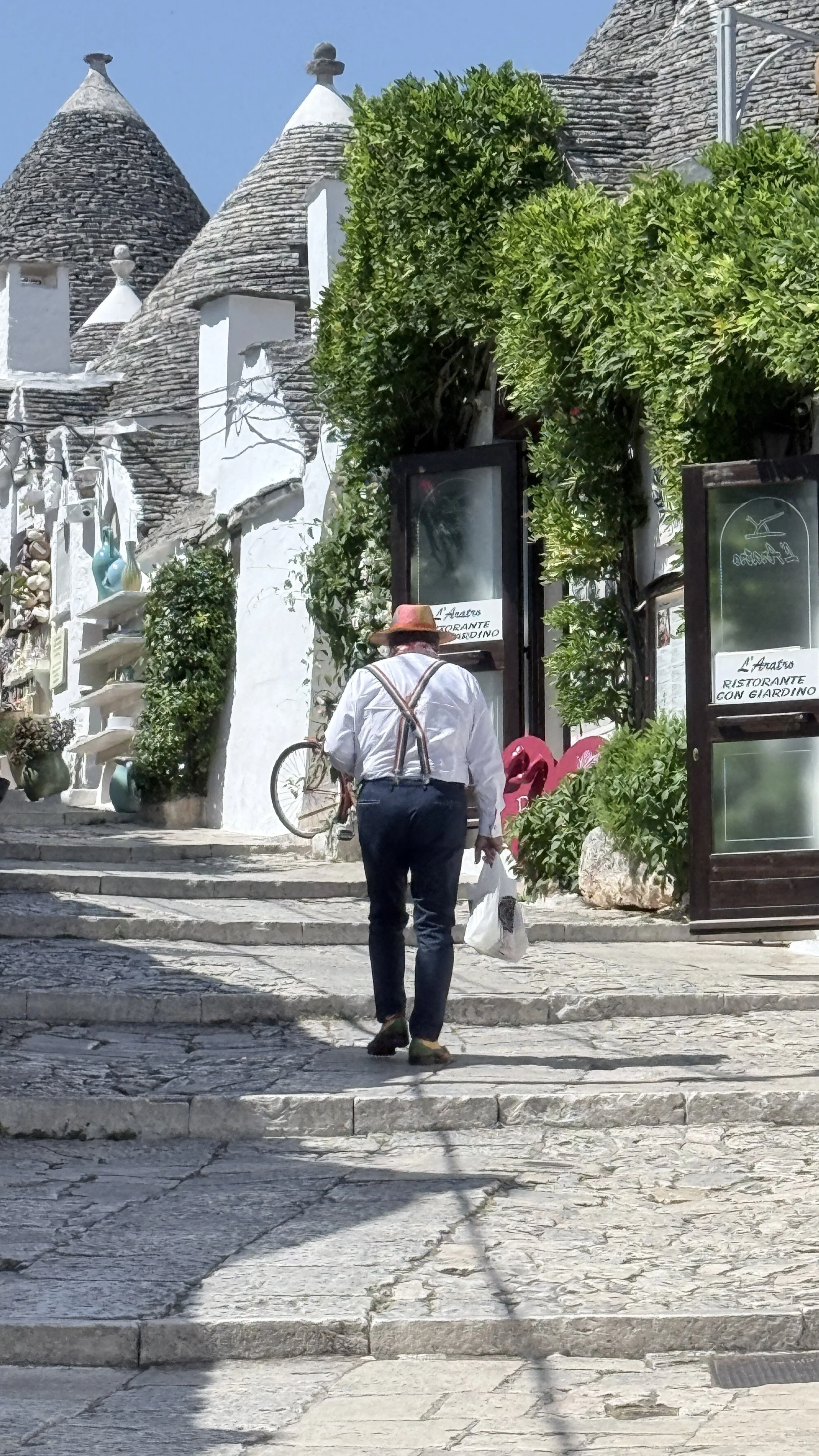 colourful local alberobello.JPEG