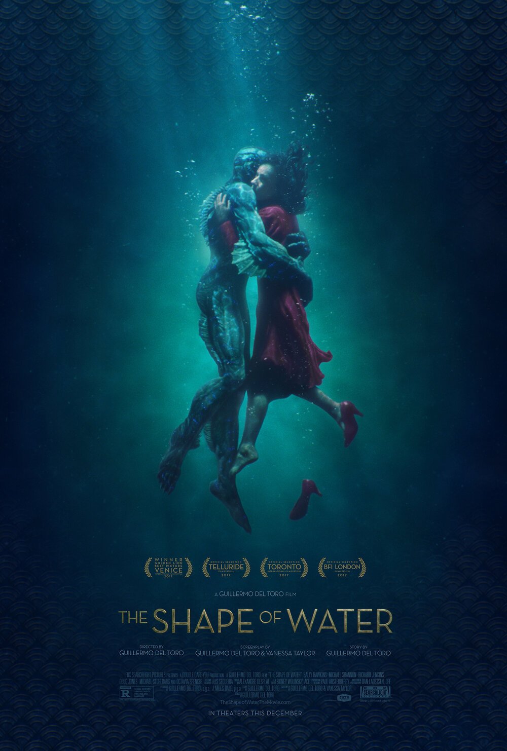 Underwater scene of two characters, a man and a woman, embracing and floating in water with a dark blue background, promoting the movie "The Shape of Water."