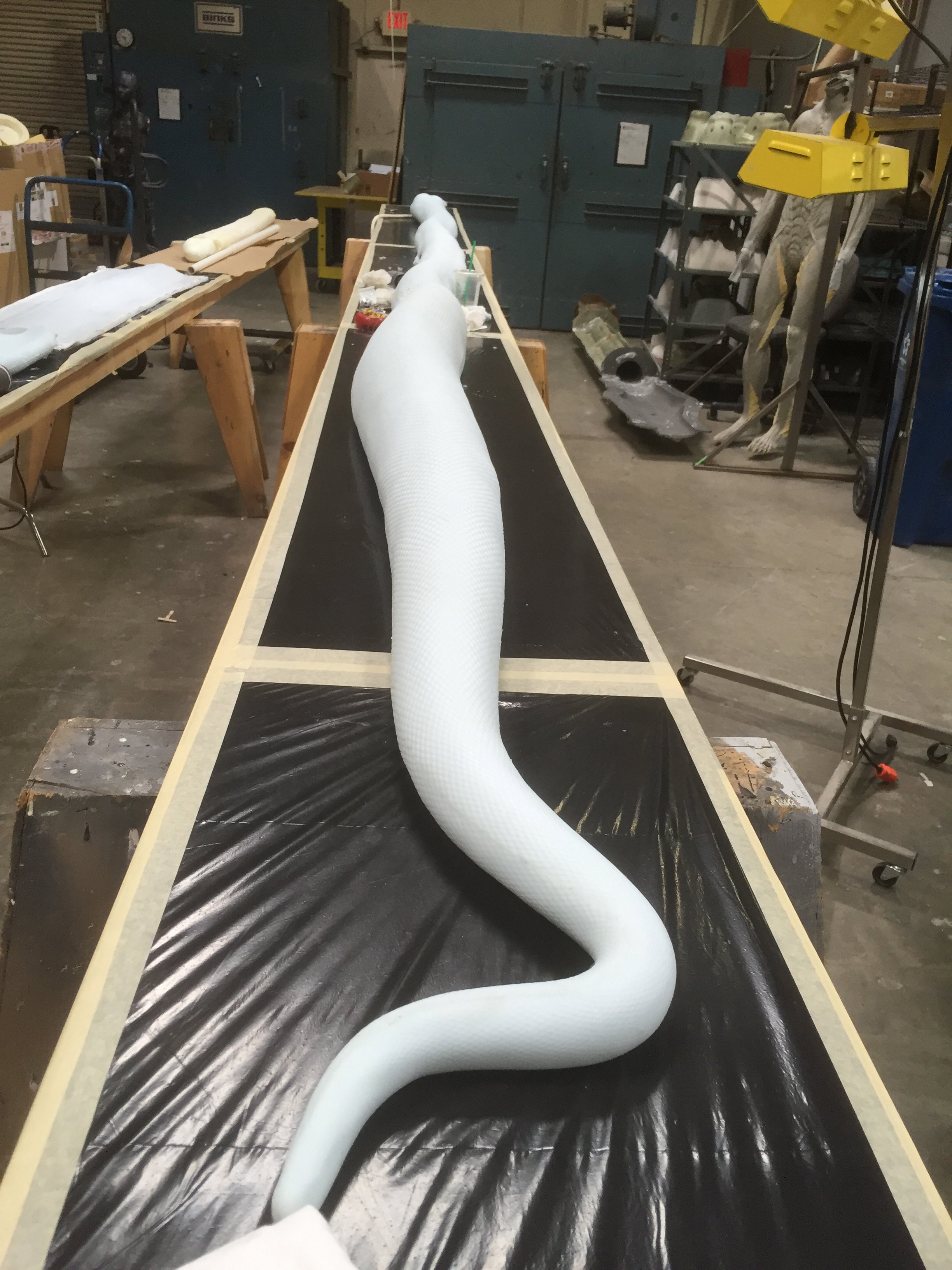Silicone seaming a snake at Legacy Effects