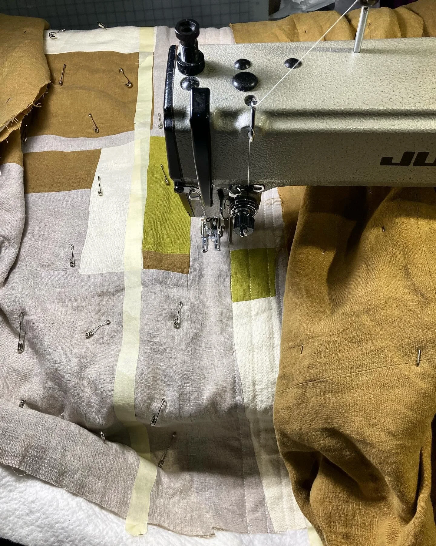 Finishing this linen improv throw quilt with some matchstick quilting 💘

The process is tedious and slow, but I find enjoyment in the monotony and repetition of sewing all those densely packed straight lines. 
*a podcast or audiobook must playing in