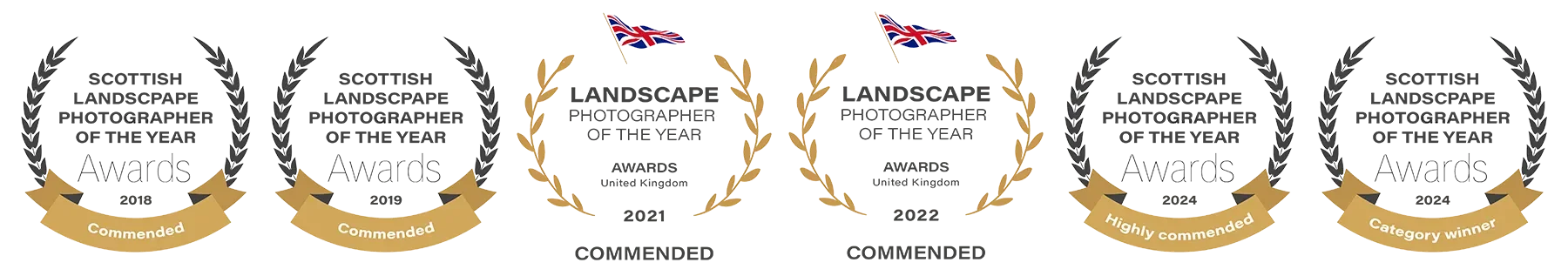 Five award medals with black, gold, and white designs, including laurel wreaths, flags, and labels such as "Commended," "Highly Recommended," and "Category Winner."