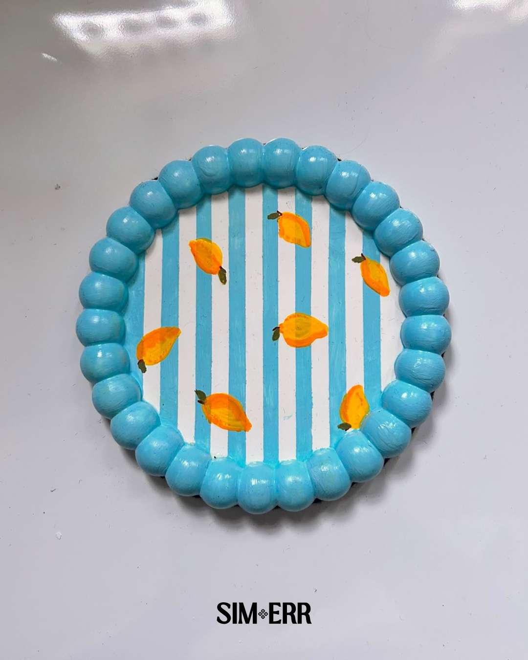 Handmade blue and white striped 6-inch bubble tray with hand-painted mangoes by Sim.err top view