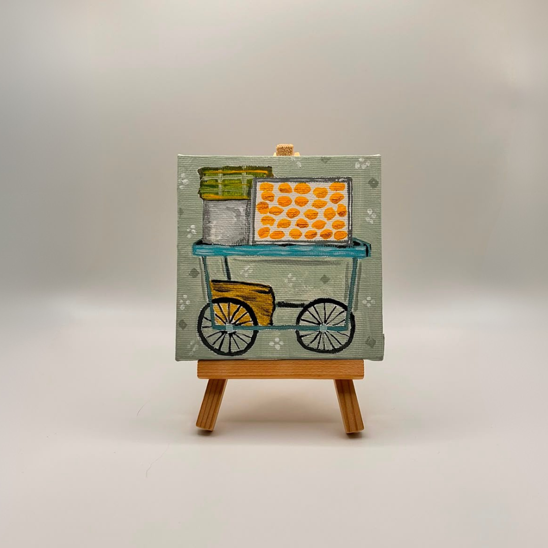 Mini canvas painting displayed on an easel as an example of a Sim.err Art Bar painting activity.