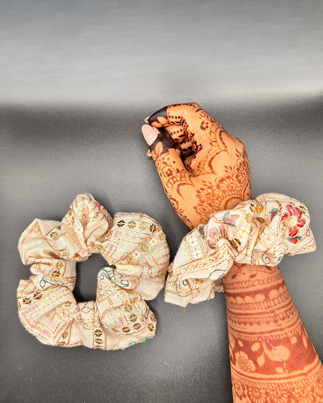 Cream embroidered fabric scrunchie with gold decorative details