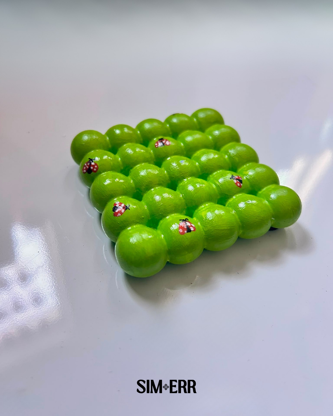 Apple green handmade bubble coaster with miniature hand-painted red ladybugs by Sim.err