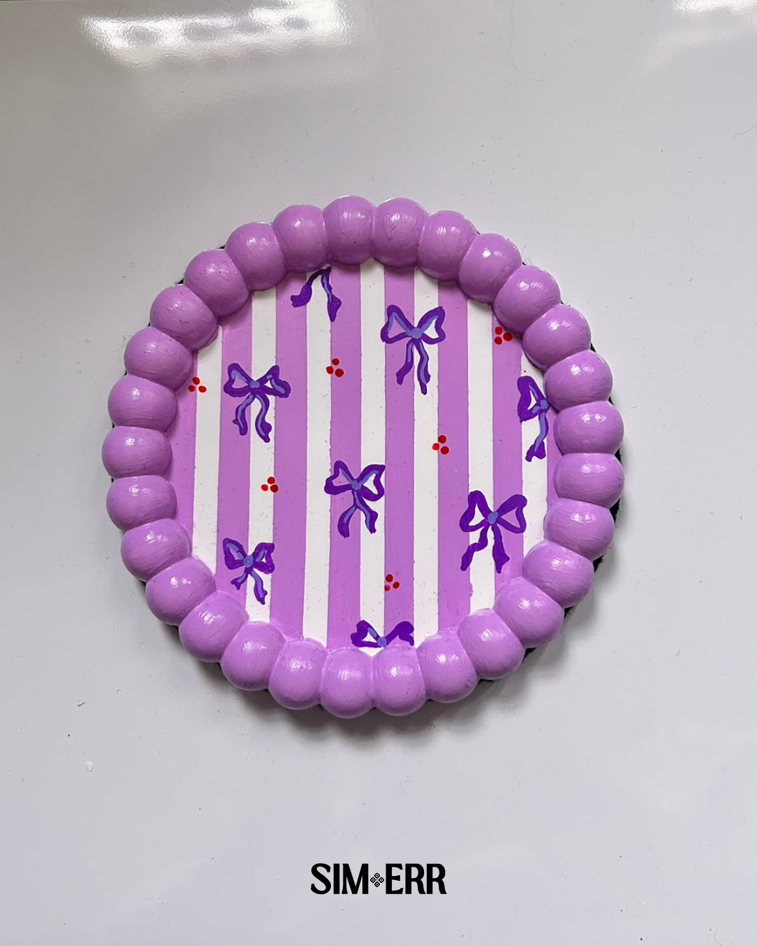 Handmade lavender and white striped bubble tray with hand-painted purple bows by Sim.err top view