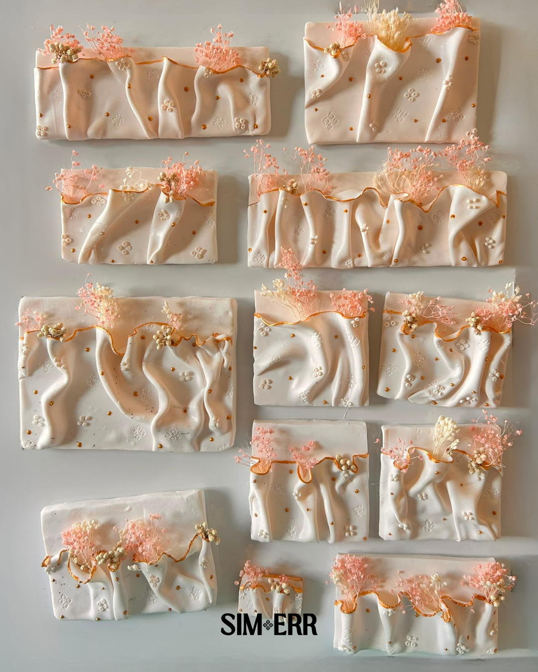 Handmade polymer clay folded fabric magnets inspired by Bandhani textiles in assorted sizes by Sim.err
