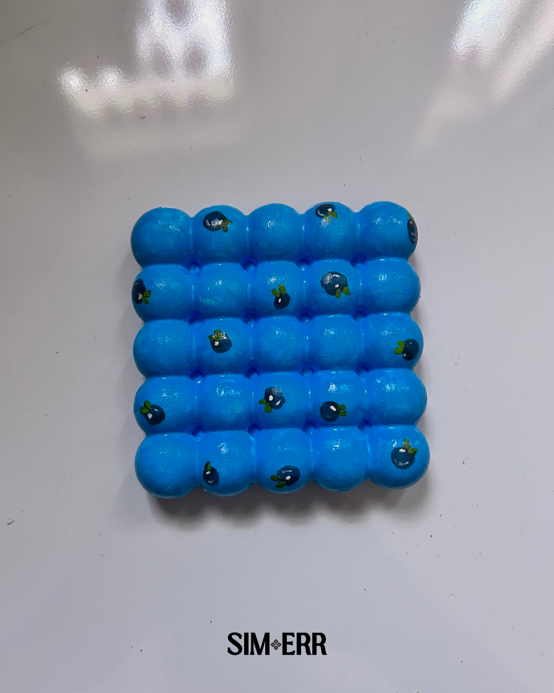 Bright blue handmade bubble coaster with miniature painted blueberries by Sim.err