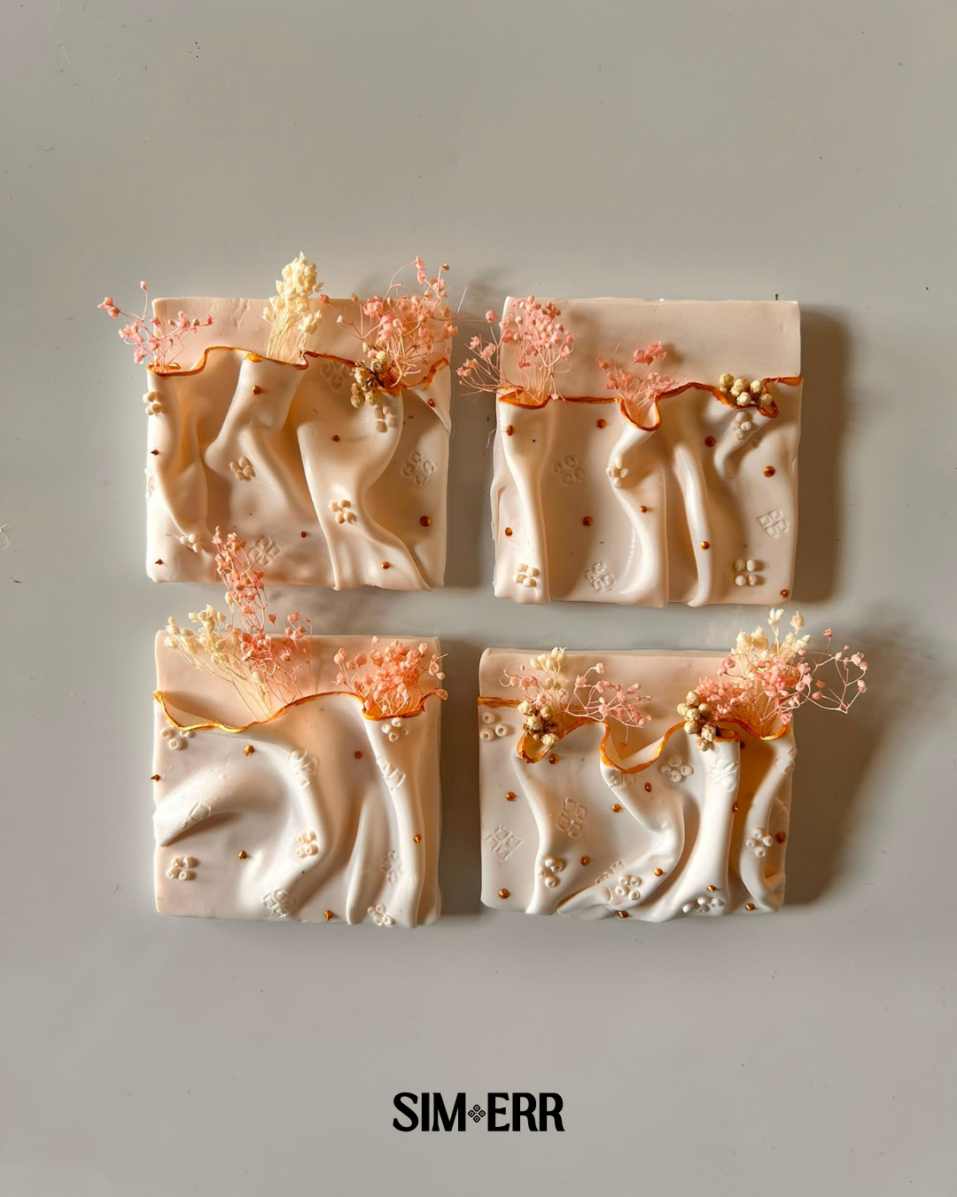 Handmade polymer clay folded fabric magnets inspired by Bandhani textiles in assorted sizes by Sim.err