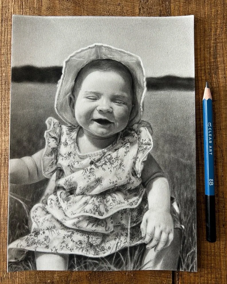 Black and white drawing of a smiling baby girl hyper-realistic, commission a portrait