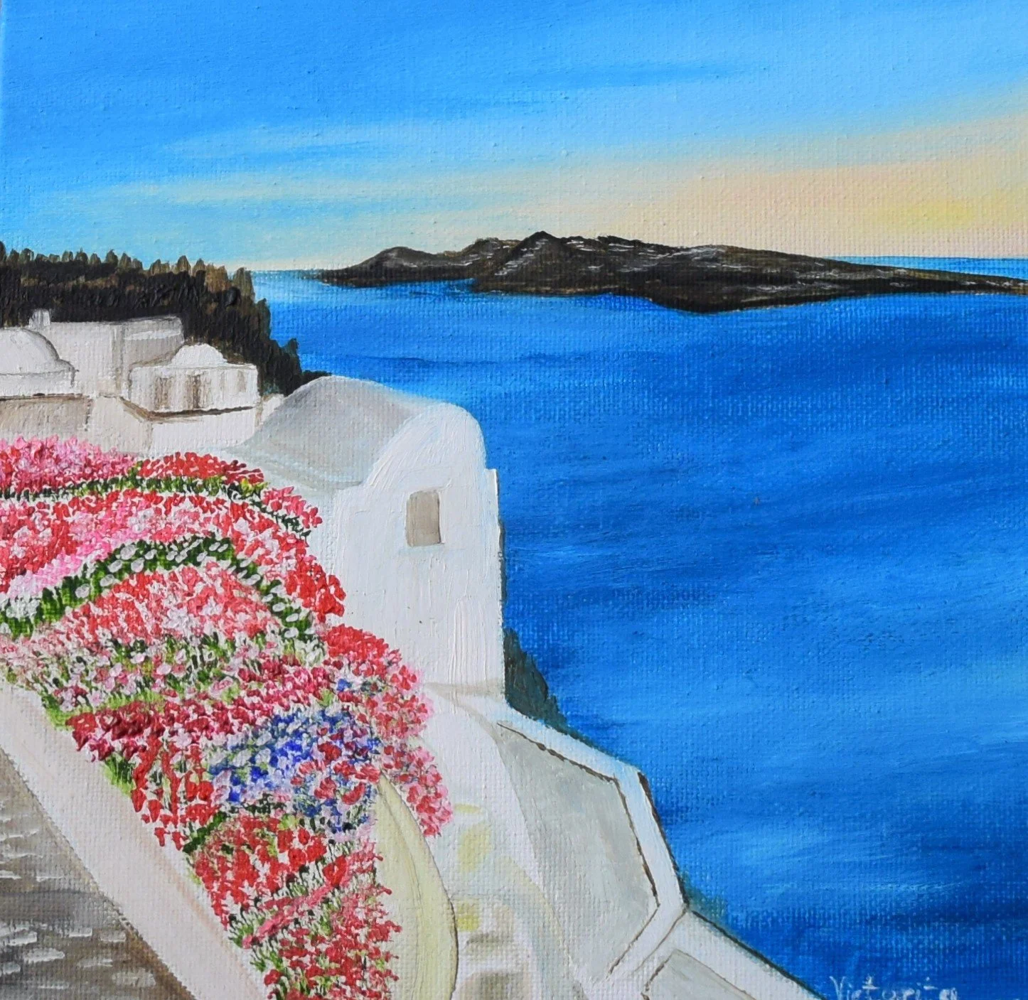 A painting of a coastal scene with white buildings, pink and red flowers on a terrace, a deep blue sea, and islands in the distance under a sky that transitions from blue to a yellowish hue near the horizon.
