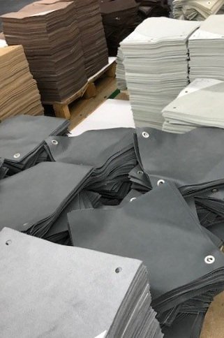 Memos - leather memos ready for their grommets