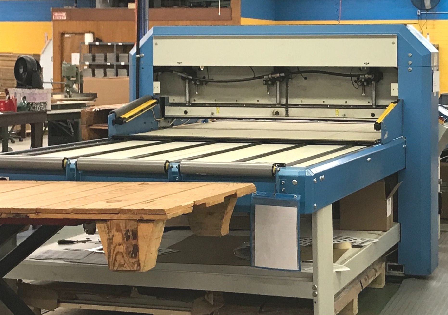 Industrial fabric cutting machine in a sample production setting