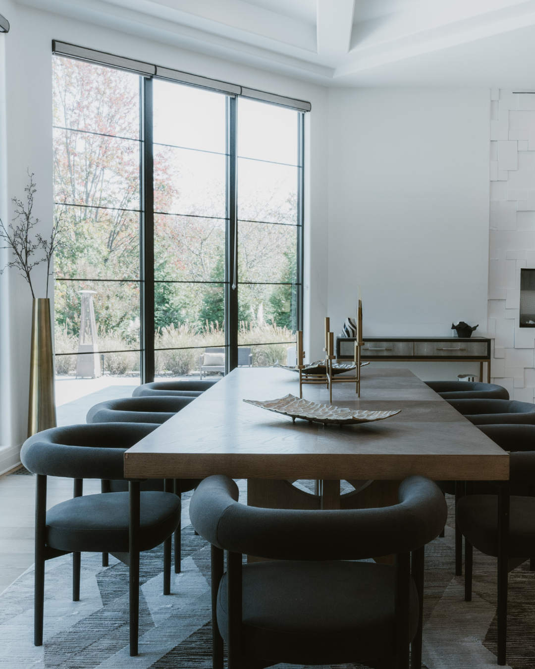 Modern dining table with wood table and black chairs