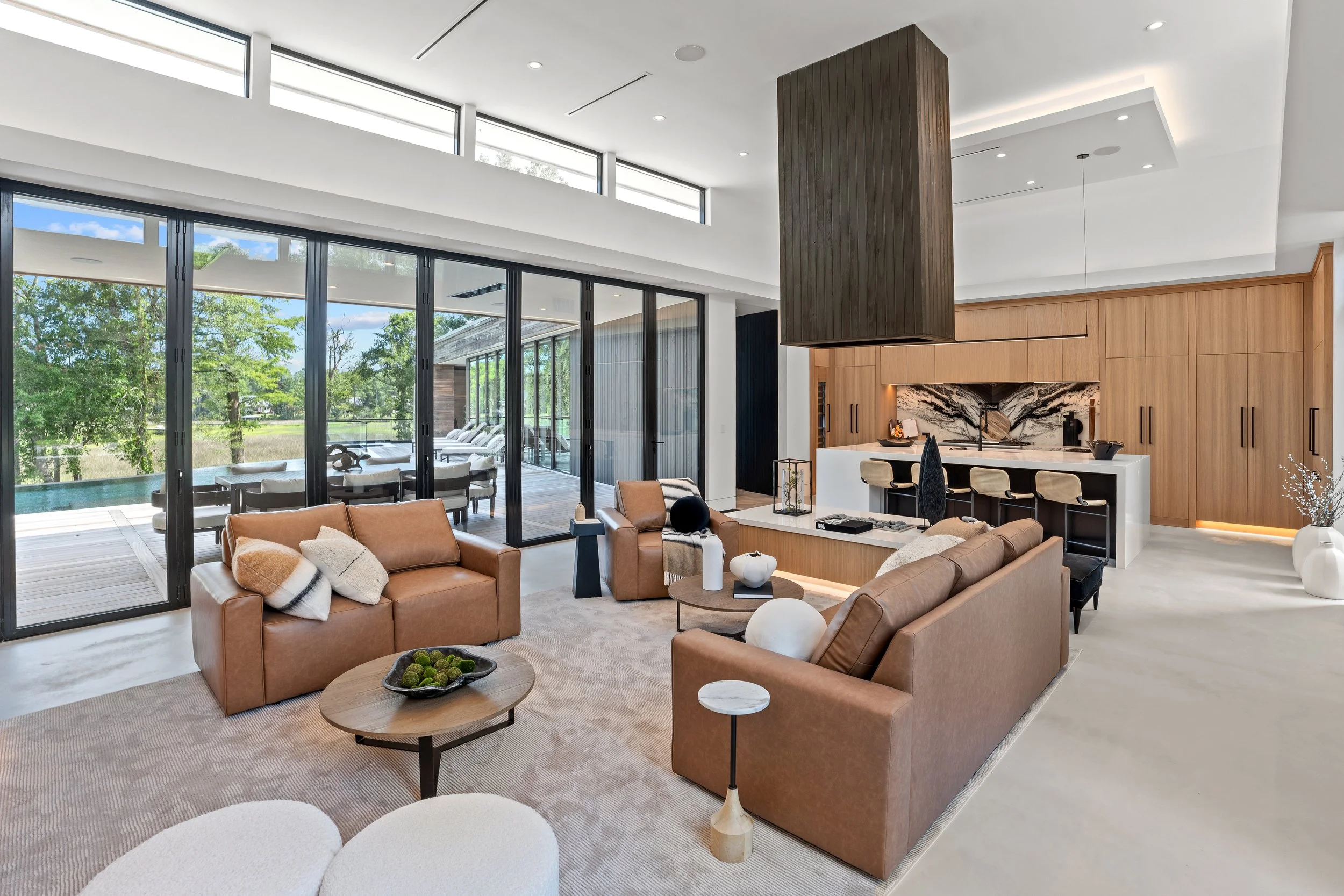 Modern living room leather seating and neutral color palette