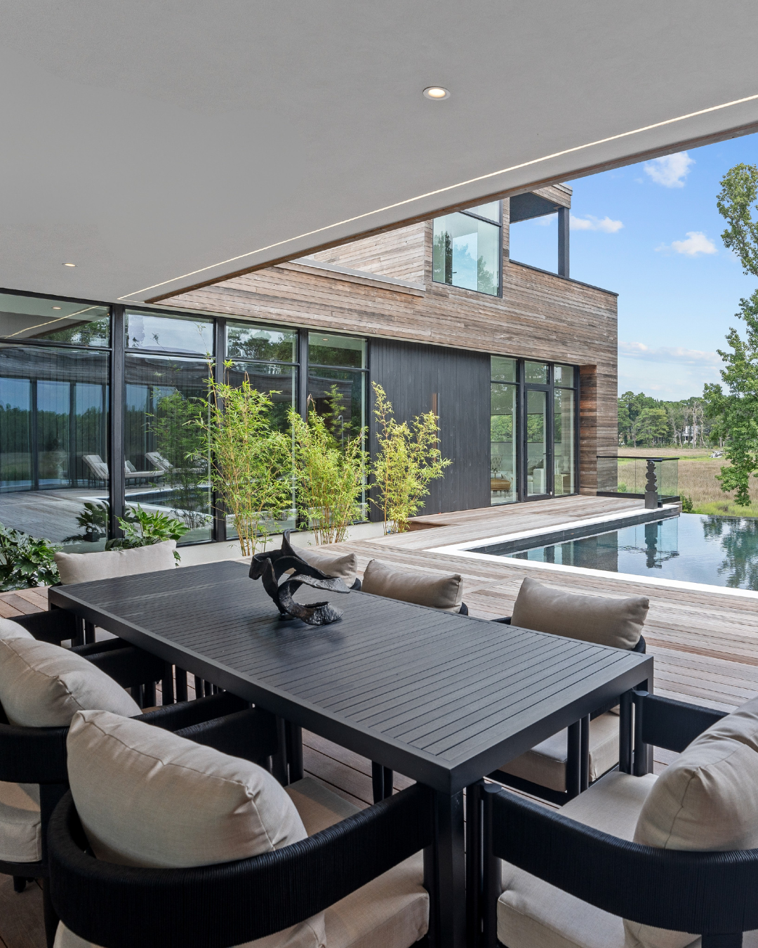 Outdoor dining space and infinity pool
