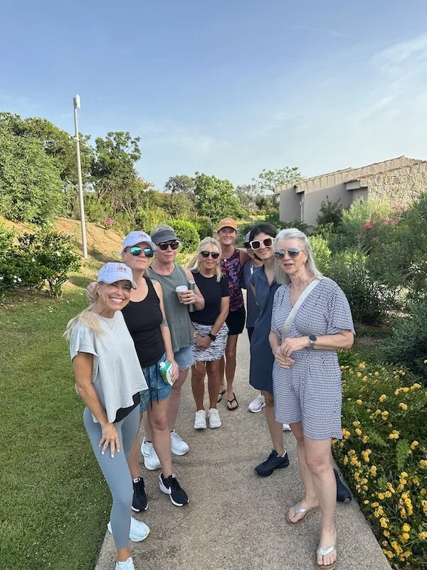 A group of mid-life women traveling in Sardinia.