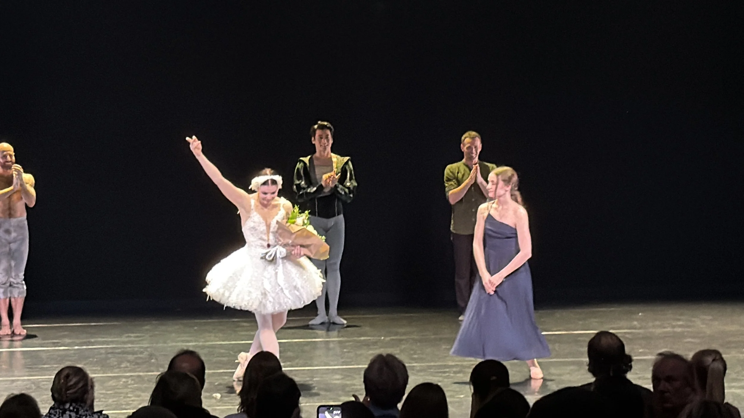 Handing flowers to Ms. Natalia Osipova taking a bow at the Sunset Center in Carmel 