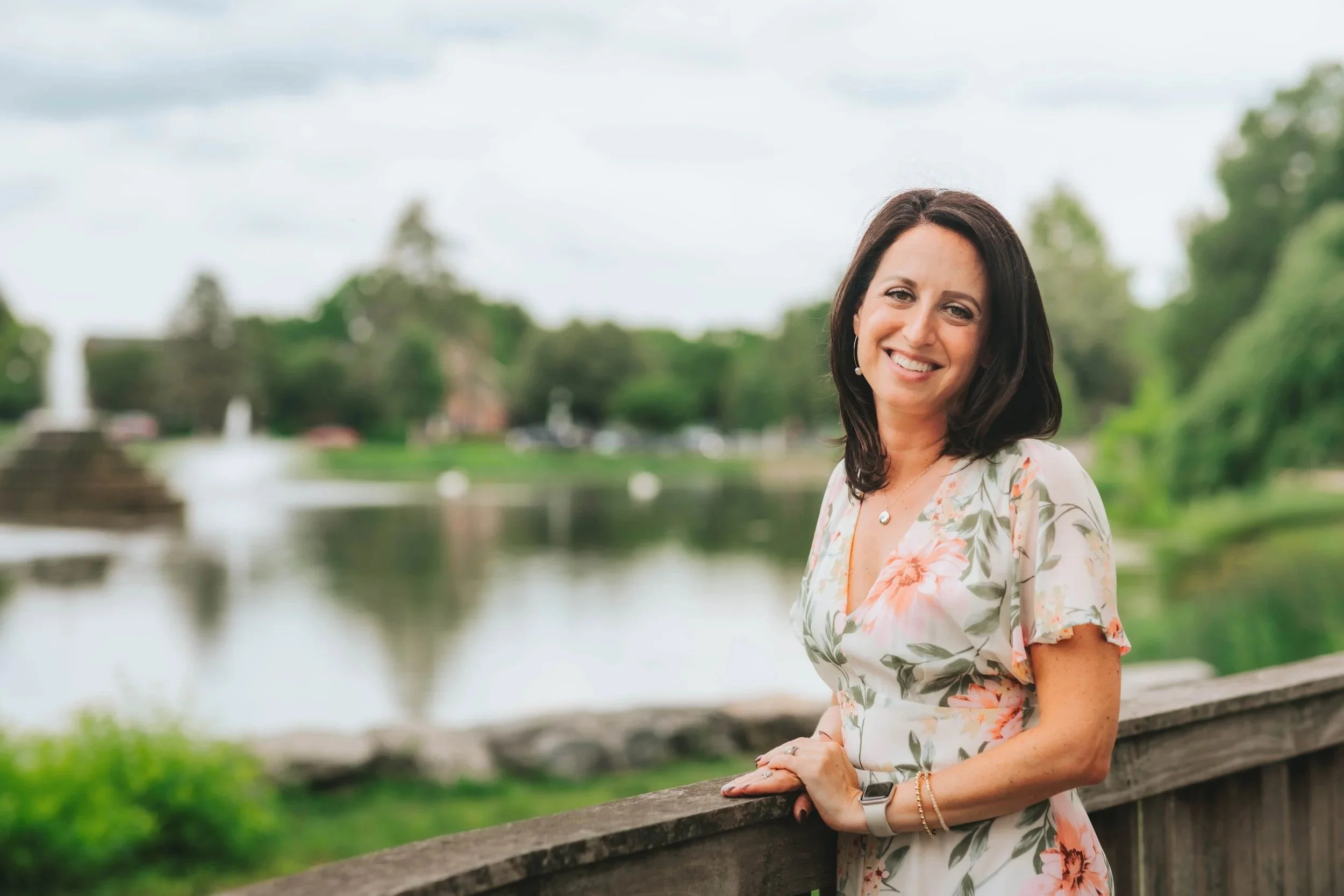 Jacqueline Laurenzi, online couples therapist in Virginia, smiling outdoors