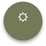 Circular button with a gear icon in the center, green background, black outer border.