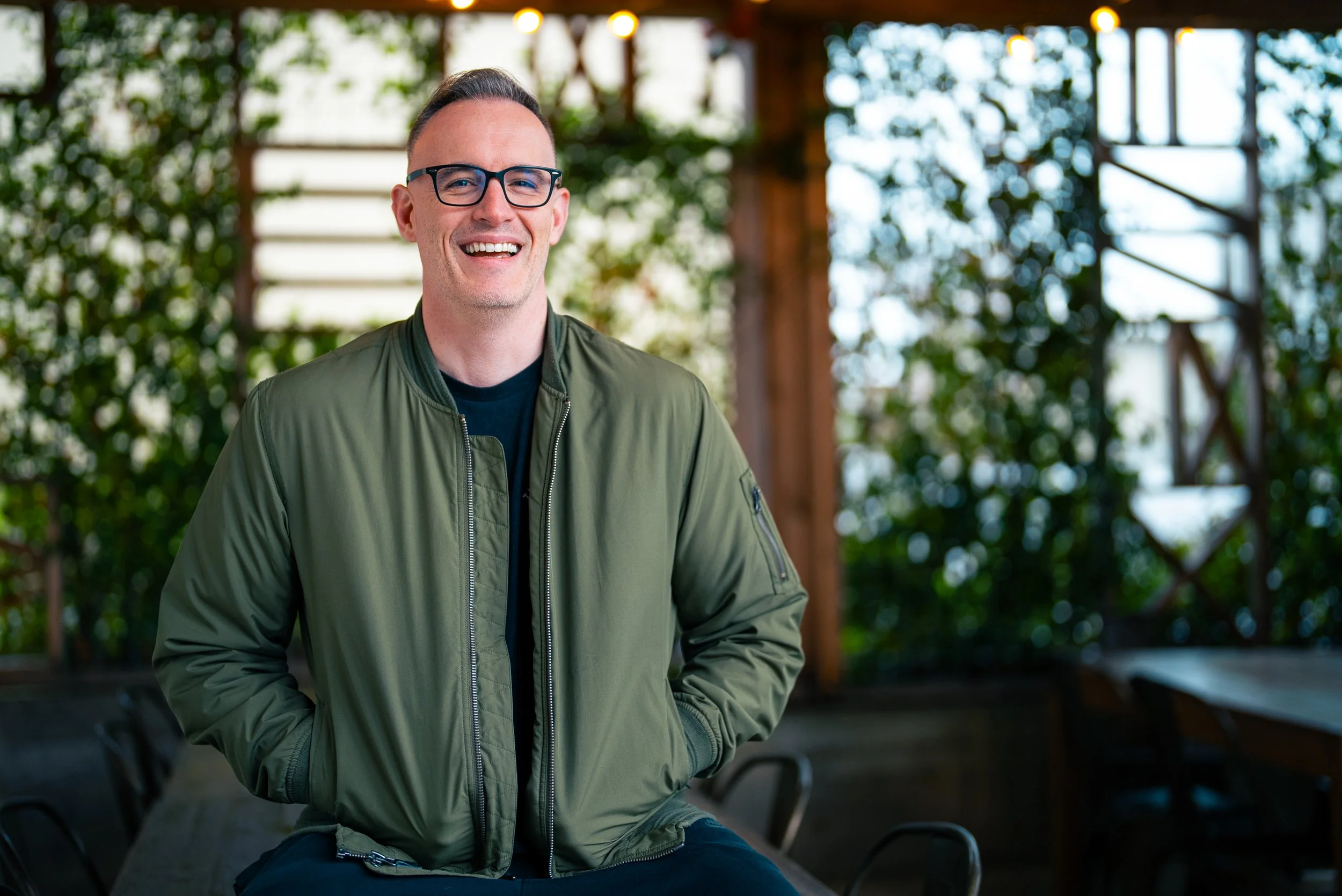 Chris laughing in a garden