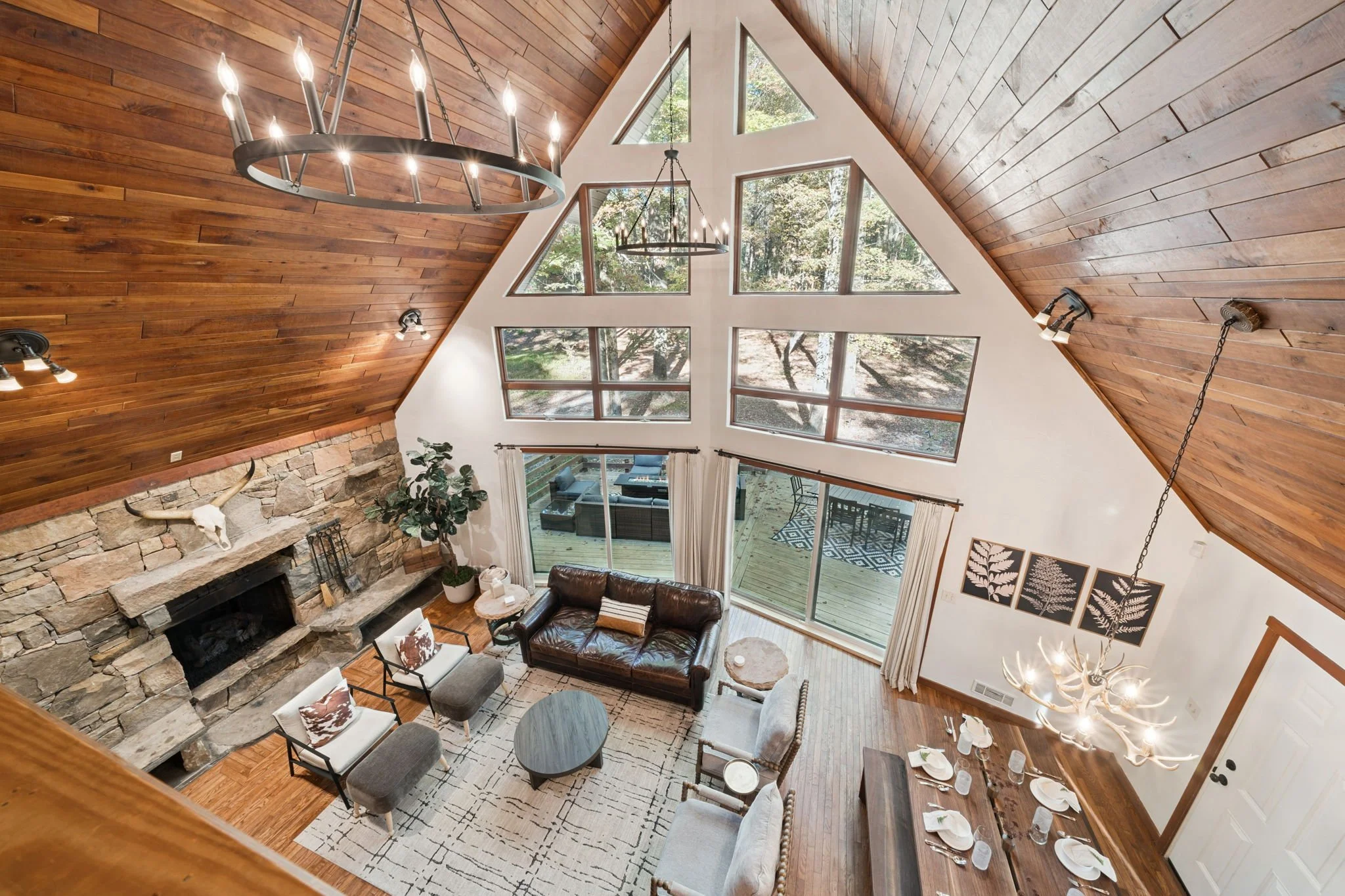 black fern cabins spacious living room with cozy fireplace and goreous views