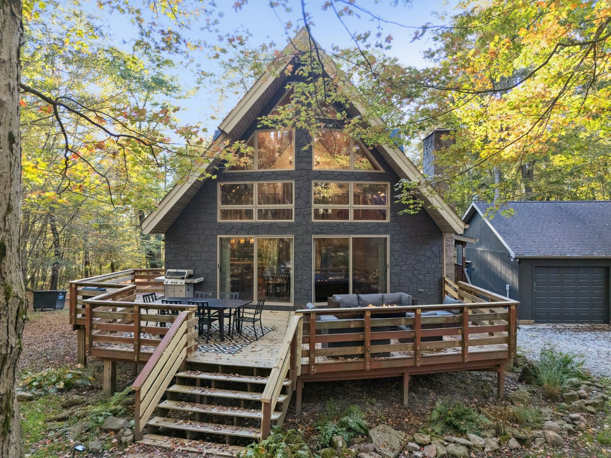black fern cabin A-frame with large entertaining deck