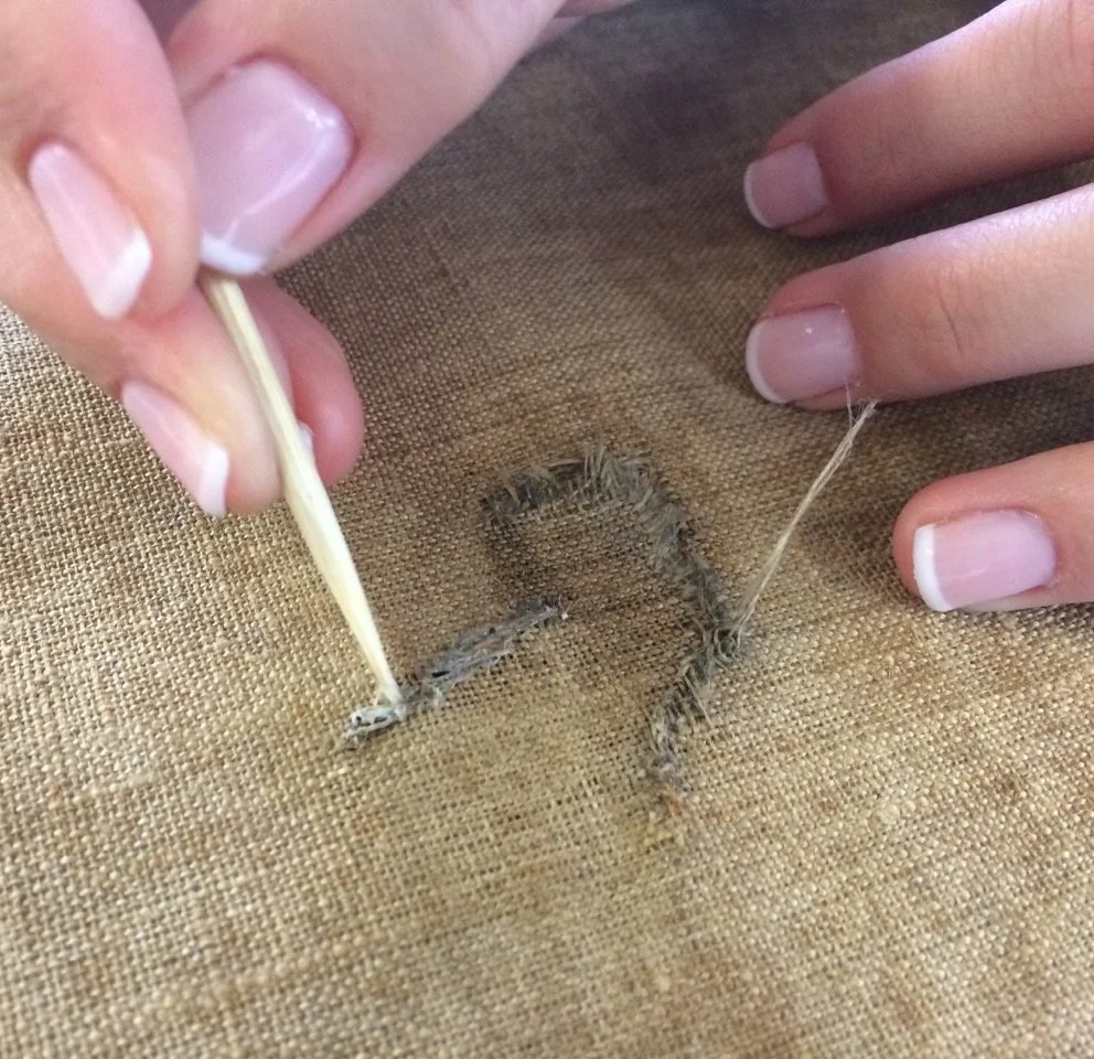 Joining the tears in the painting’s canvas.