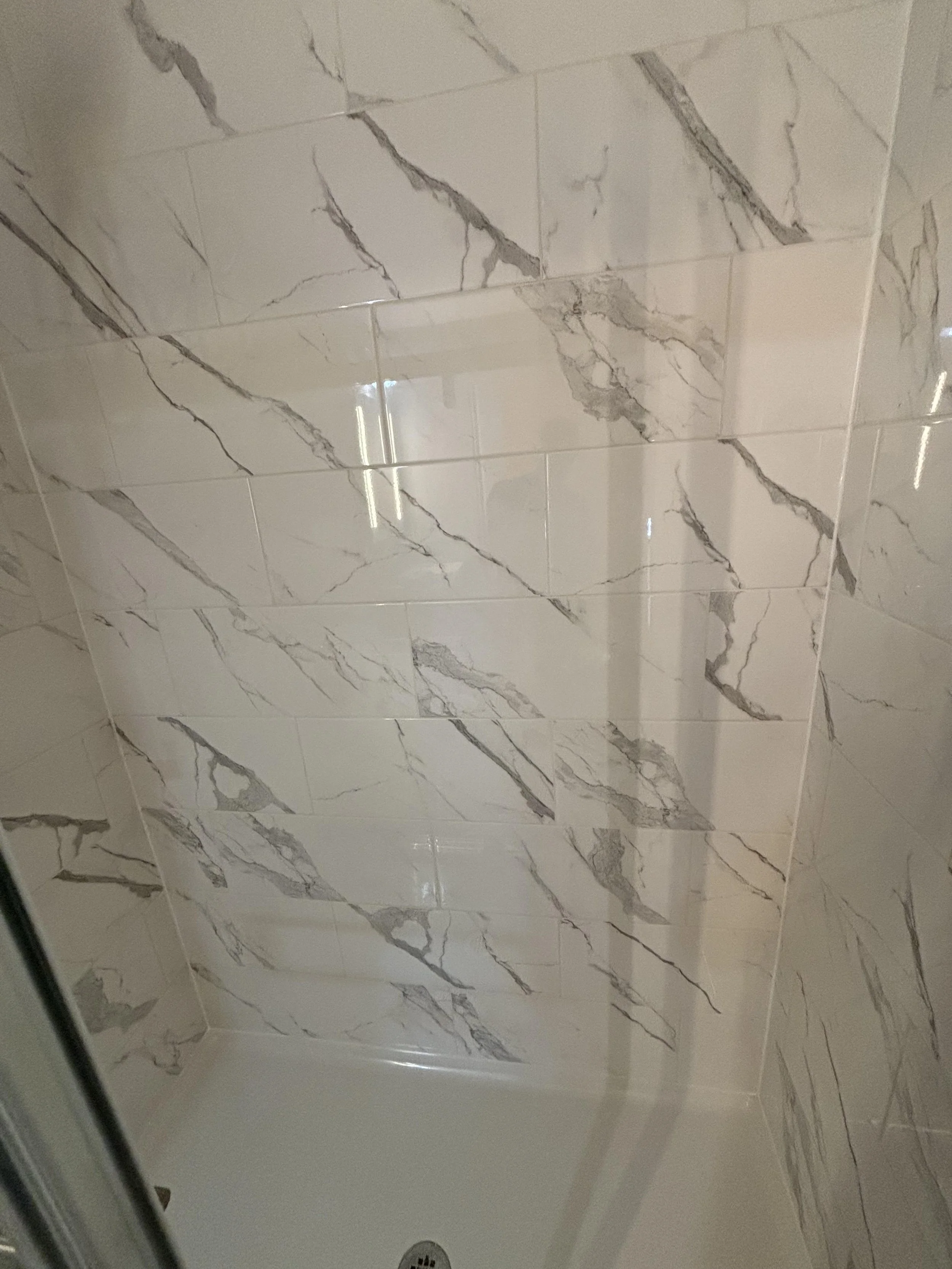 Beautiful Shower Renovation with Marble White Tile in Germantown, WI