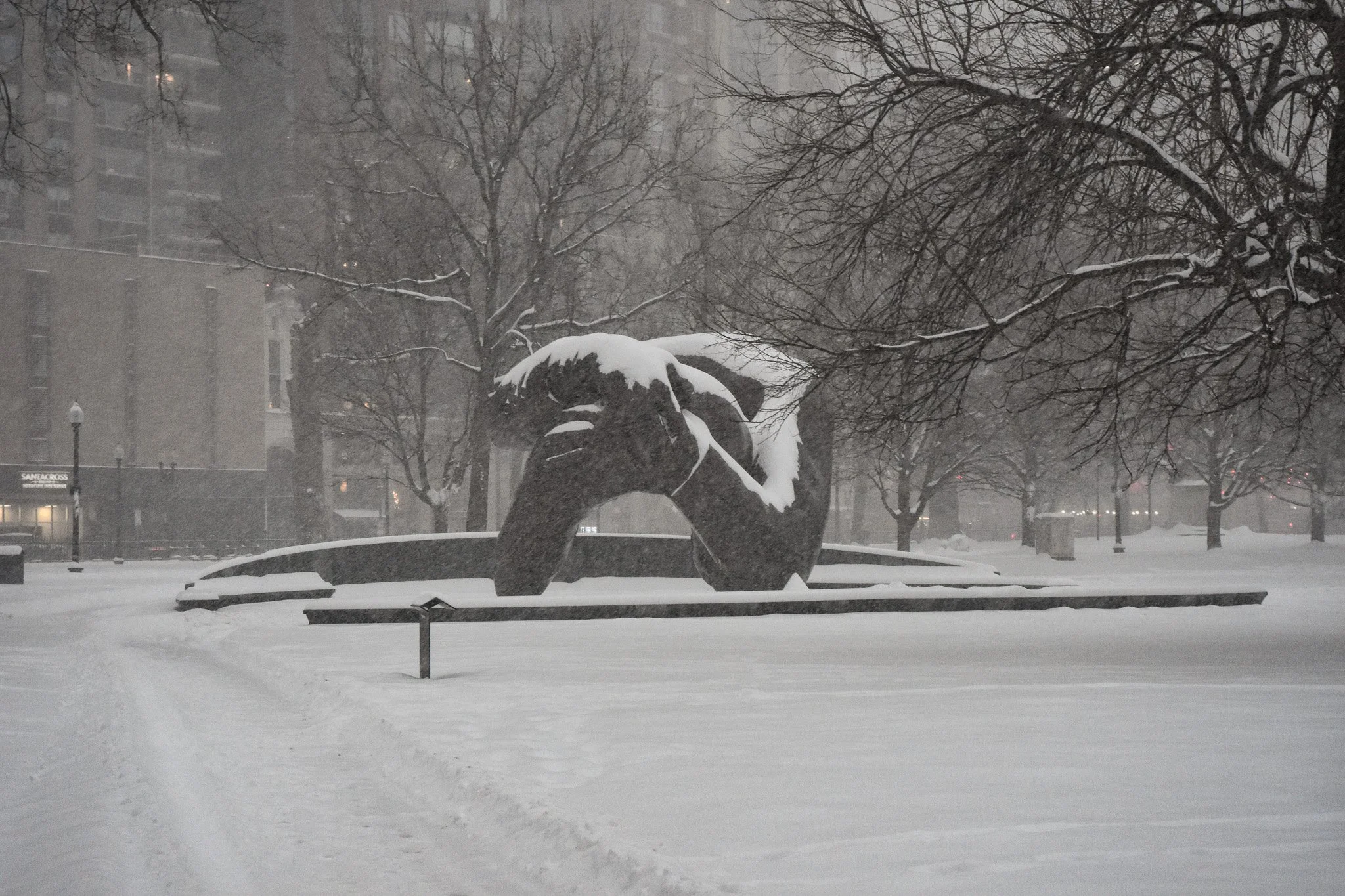 Boston, MA: Jan. 25 -  The Embrace Statue with an added layer of snow. 