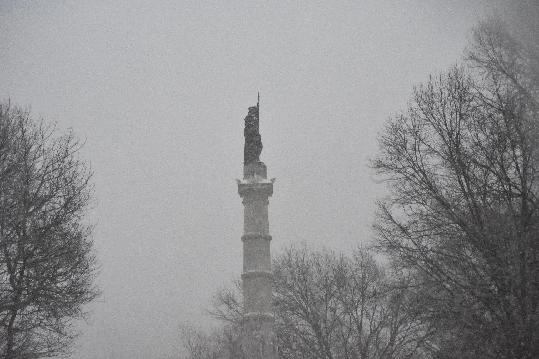 Boston, MA: Jan. 25 -  The Soldiers and Sailors Monument stands tall in the storm. 