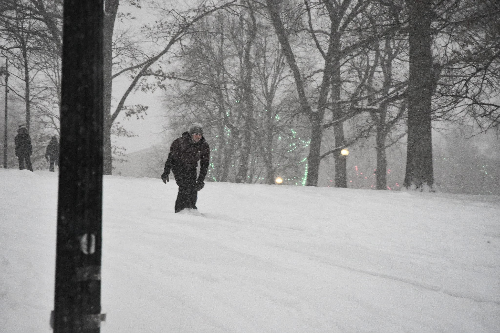 Boston, MA: Jan. 25 -  A skier glides down a hill in the Boston Common. 