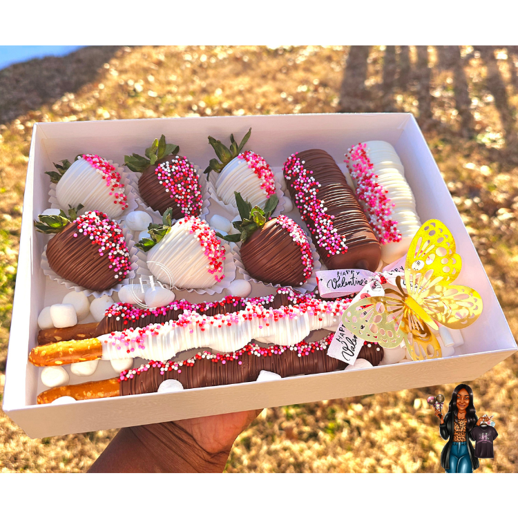 Decorative round wooden sign with the phrase "Welcome to our beautiful chaos" in black lettering, adorned with a white bow and greenery at the top, hanging on a black door surrounded by stone walls.