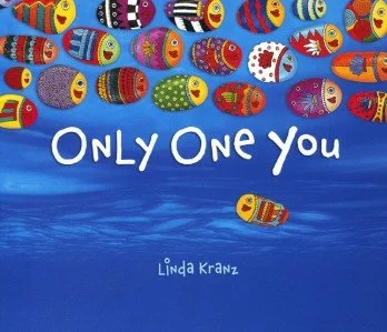 Colorful decorated Easter eggs floating on water with the text 'ONLY ONE YOU' and author name 'Linda Kranz'.