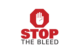 Stop the bleed symbol featuring a red octagon stop sign with a white hand and the words STOP THE BLEED