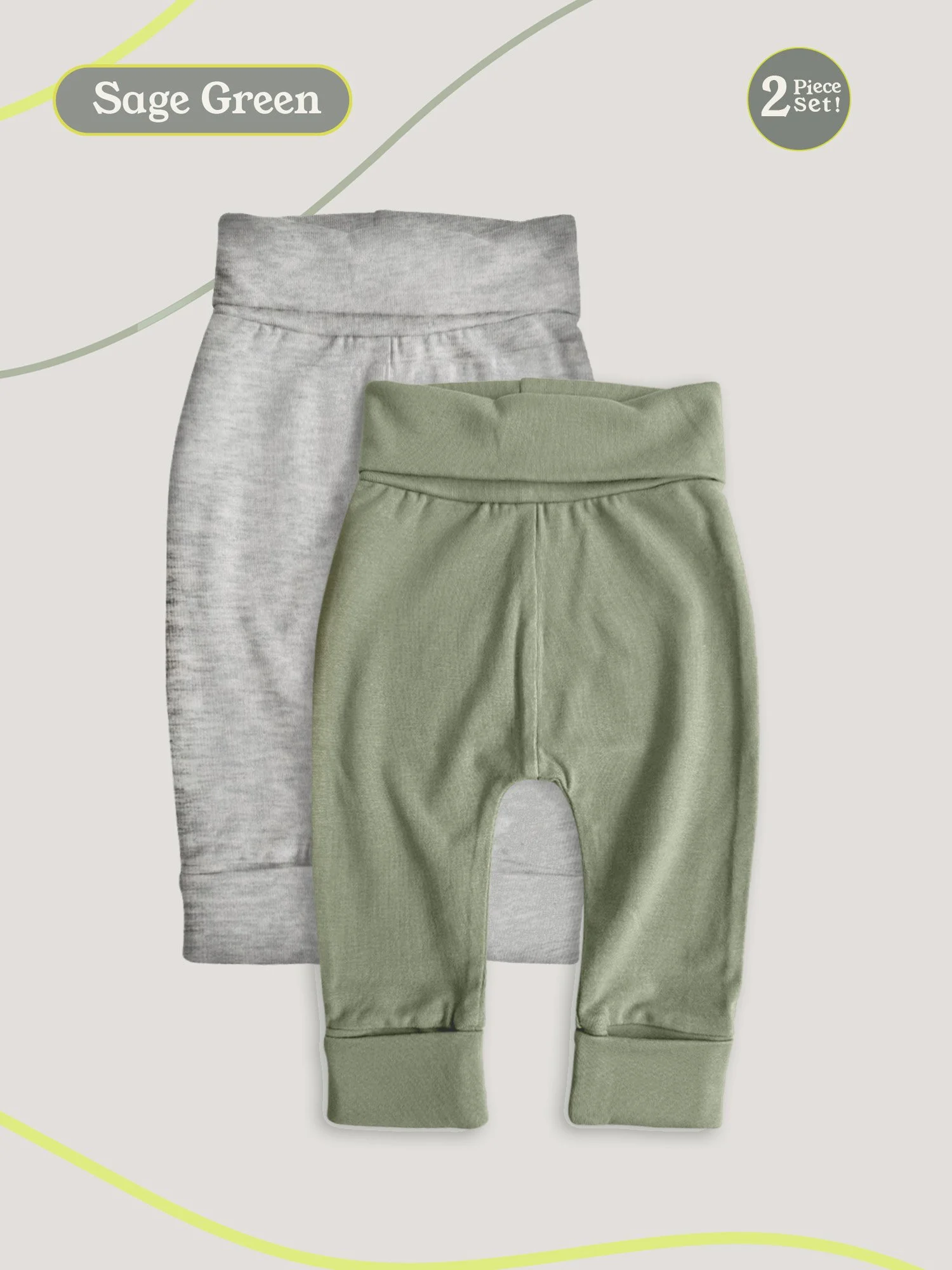 Flat lay of two pairs of baby pants in heather gray and sage green on a neutral background.
