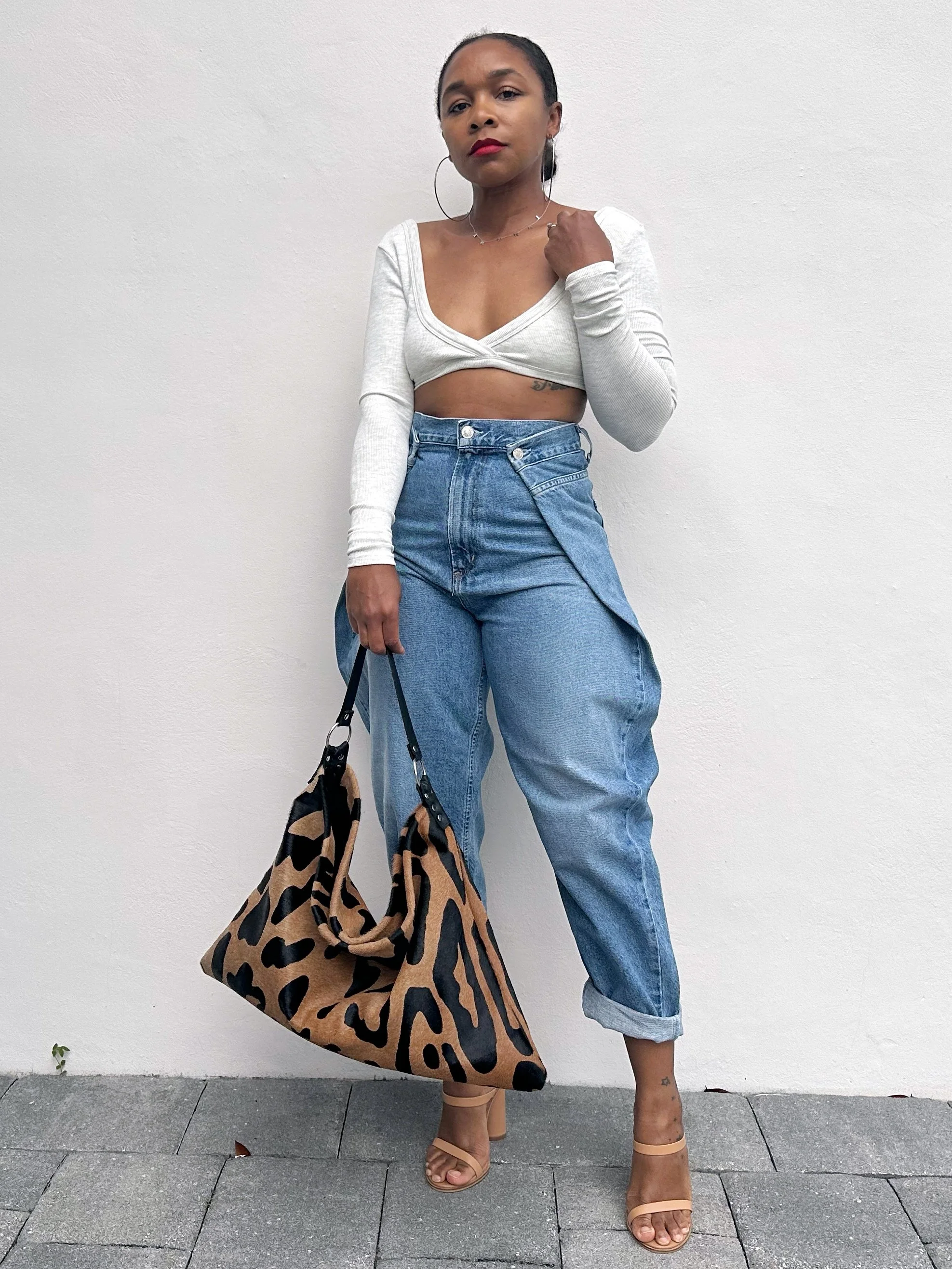 Folded Jeans &amp; Jaguar Shoulder Bag