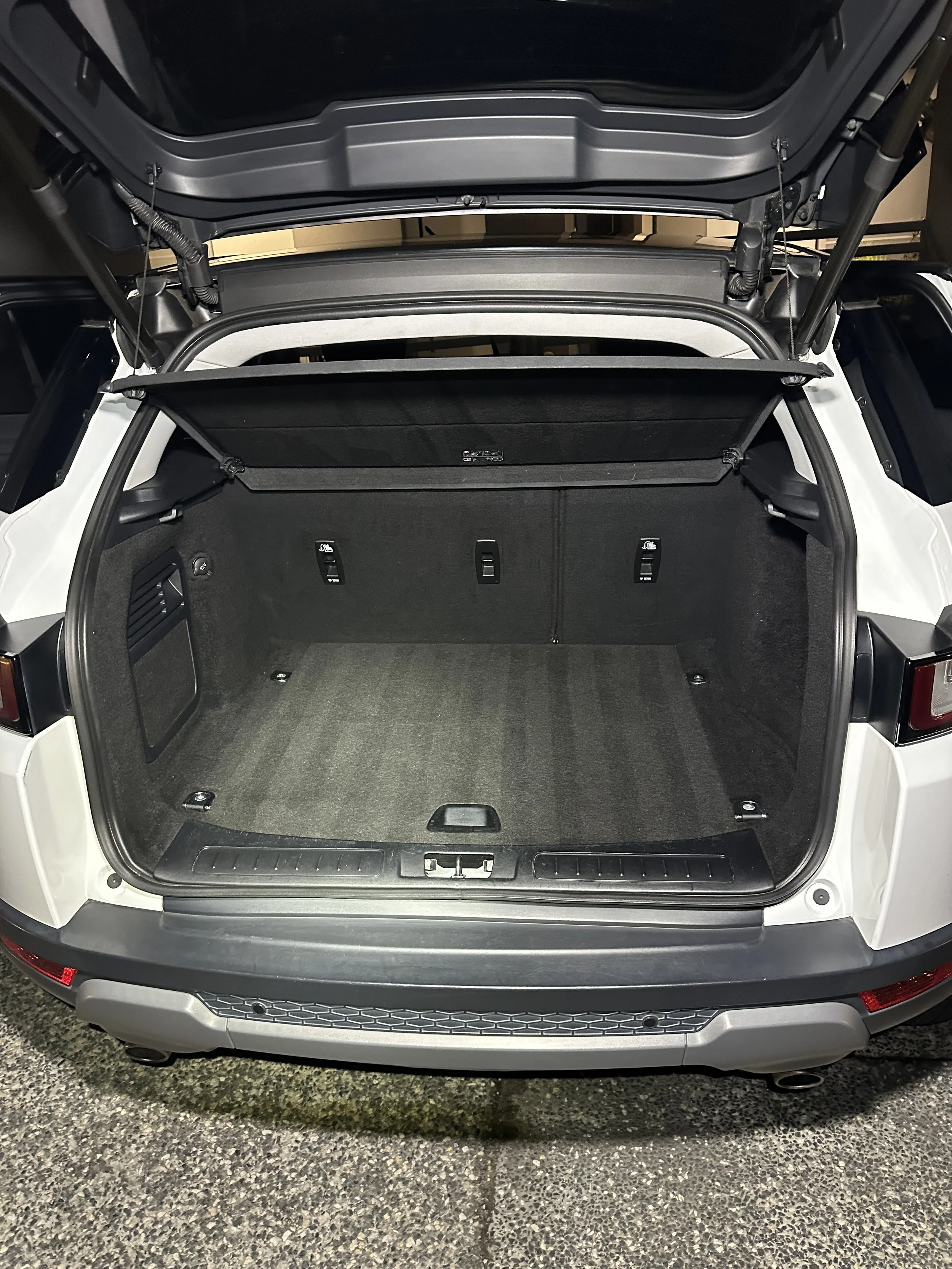 A spotless, freshly detailed SUV trunk after Steam & Gleam’s interior detailing service, highlighting a clean and organized cargo area.