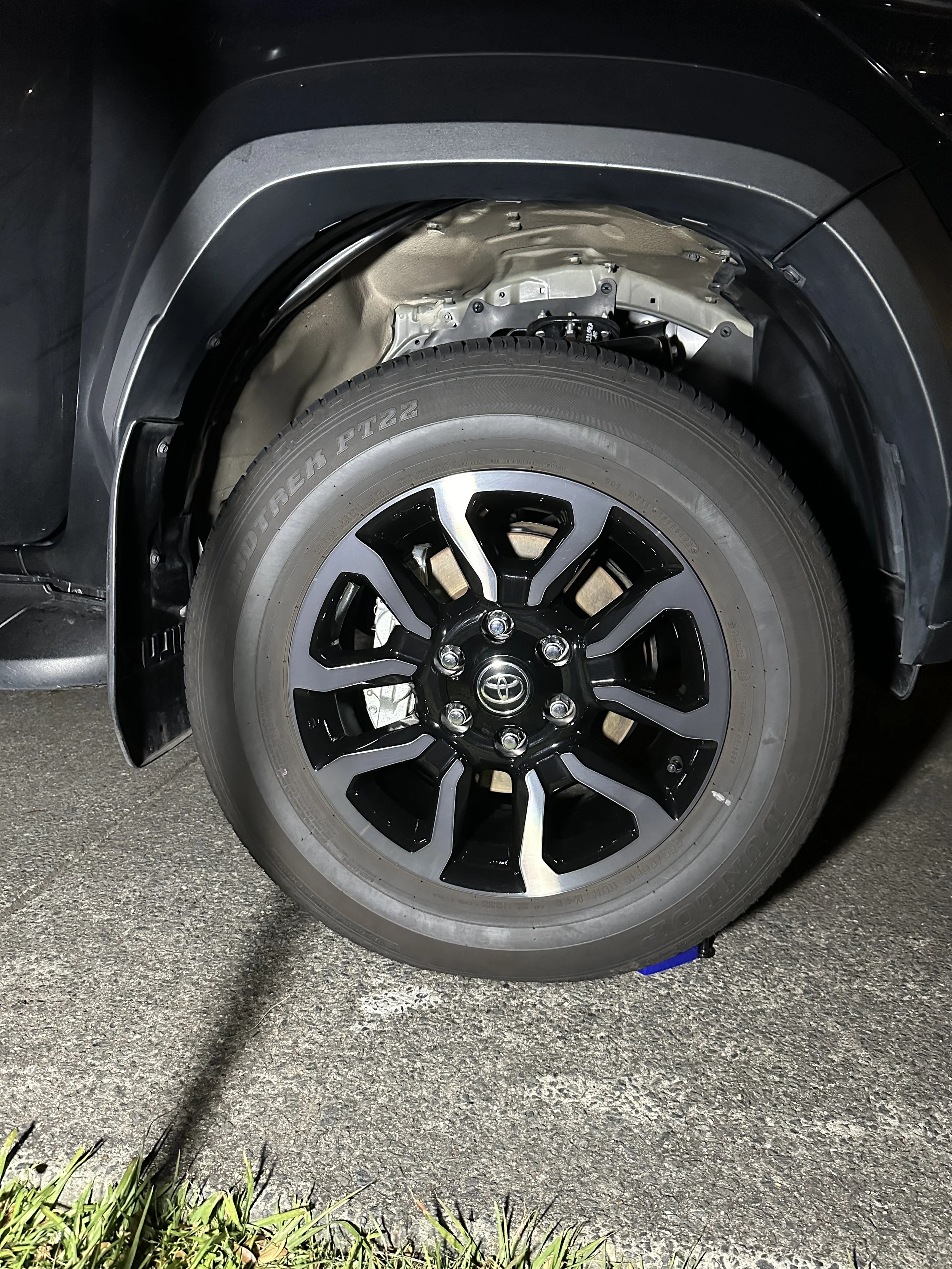 A Toyota wheel well cleaned to perfection by Steam & Gleam, showcasing thorough detailing and attention to every component.