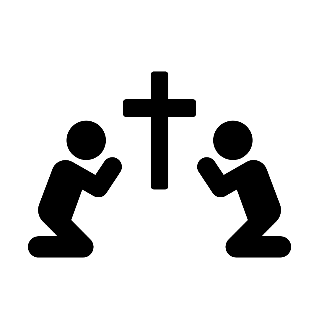 Silhouette of two kneeling figures praying in front of a cross.