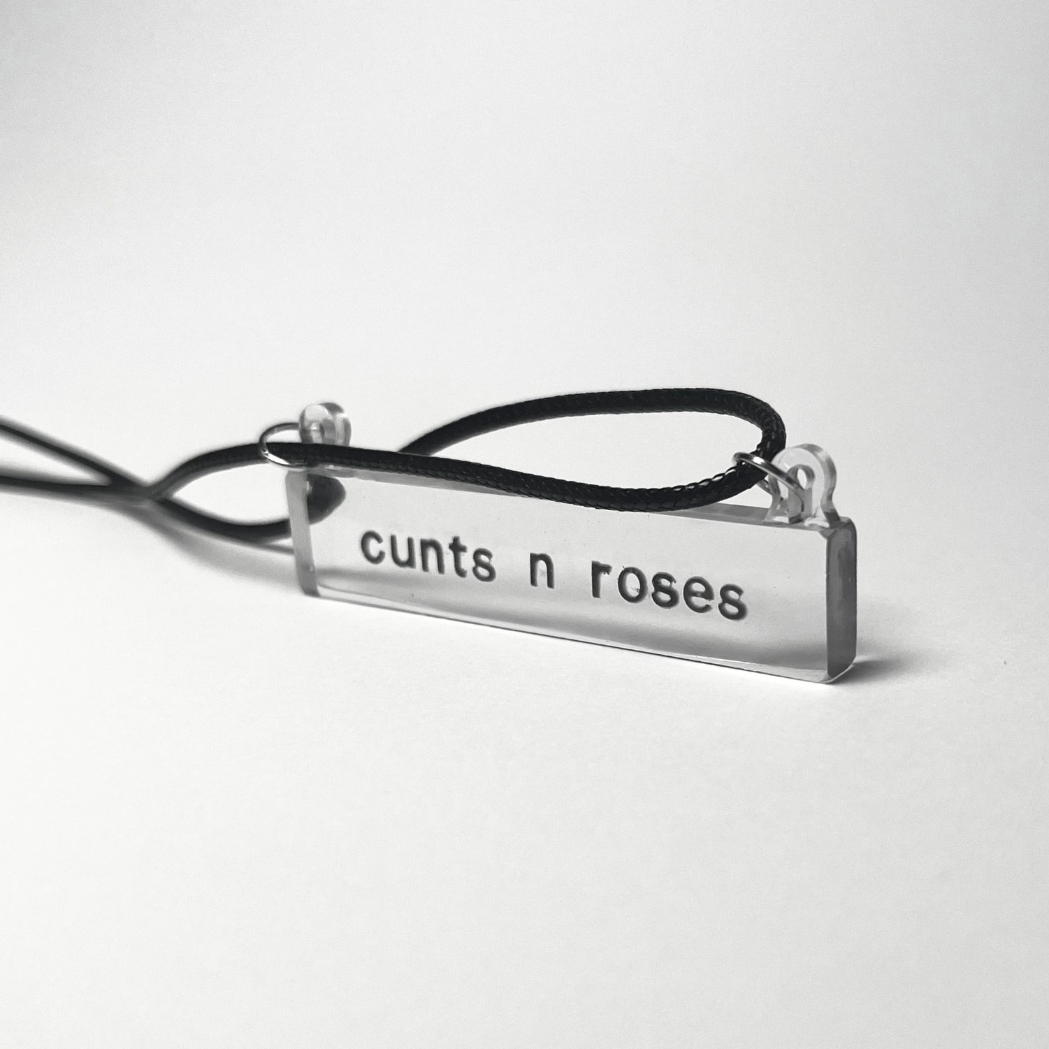 transparent necklace inspired by guns and roses.