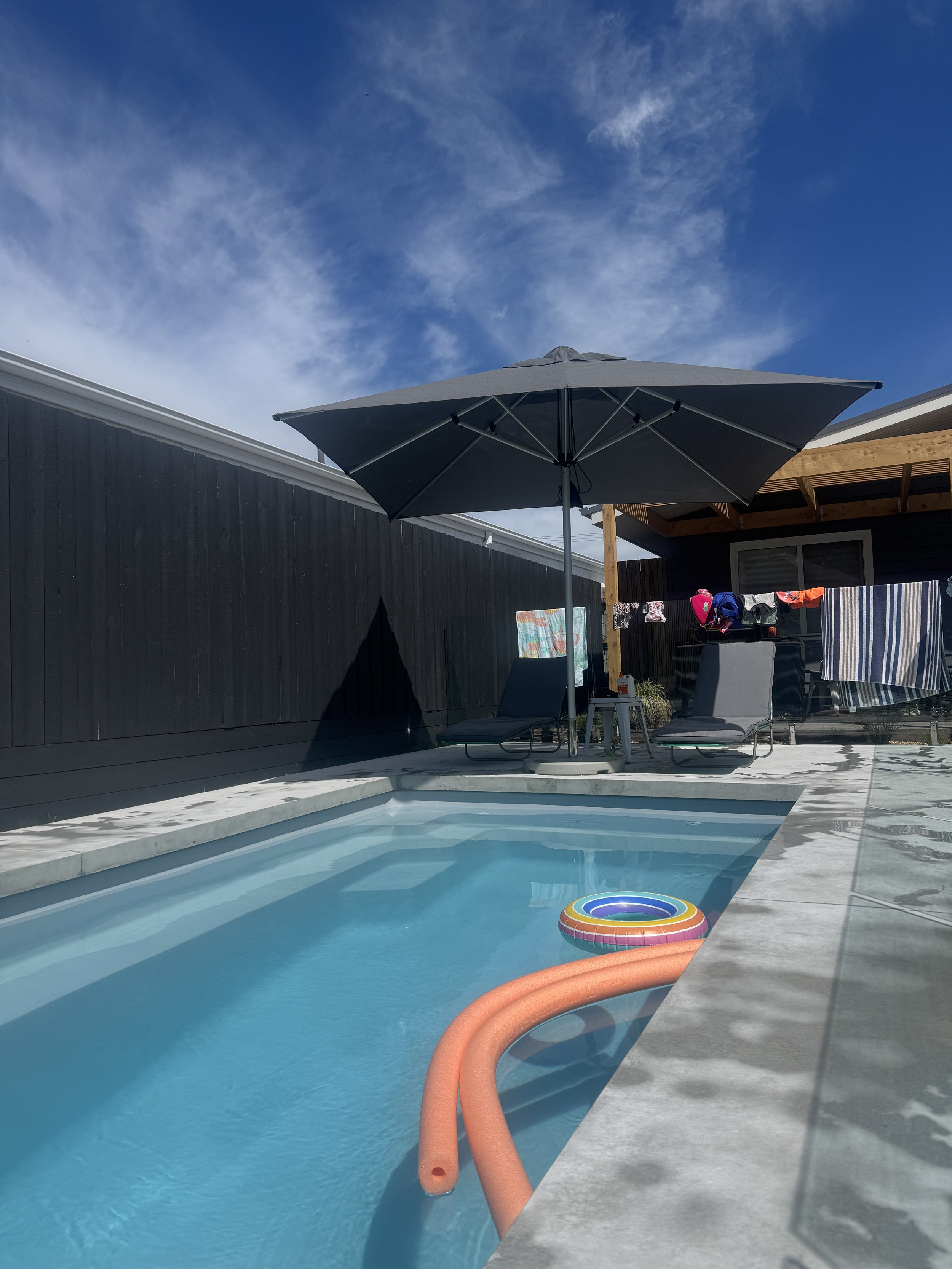 Monaco aluminium garden umbrella in Australian backyard – UV protection and portable design