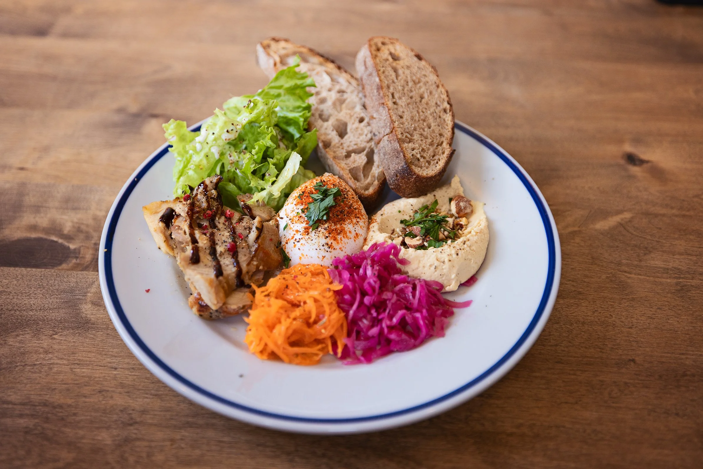 a plate of iconiq coffee food with a variety of types of food in kadena okinawa