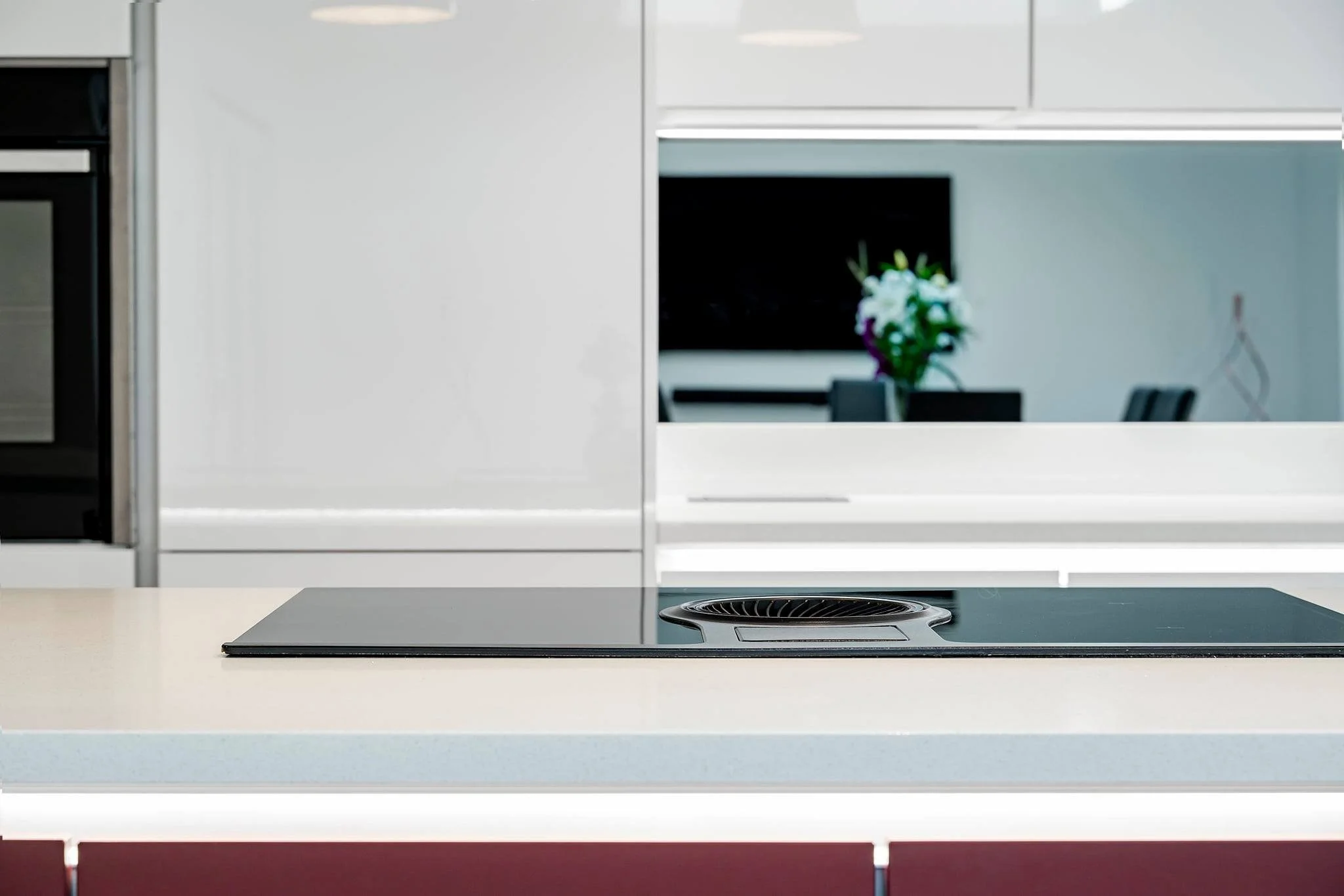 white quartz worktop with hob