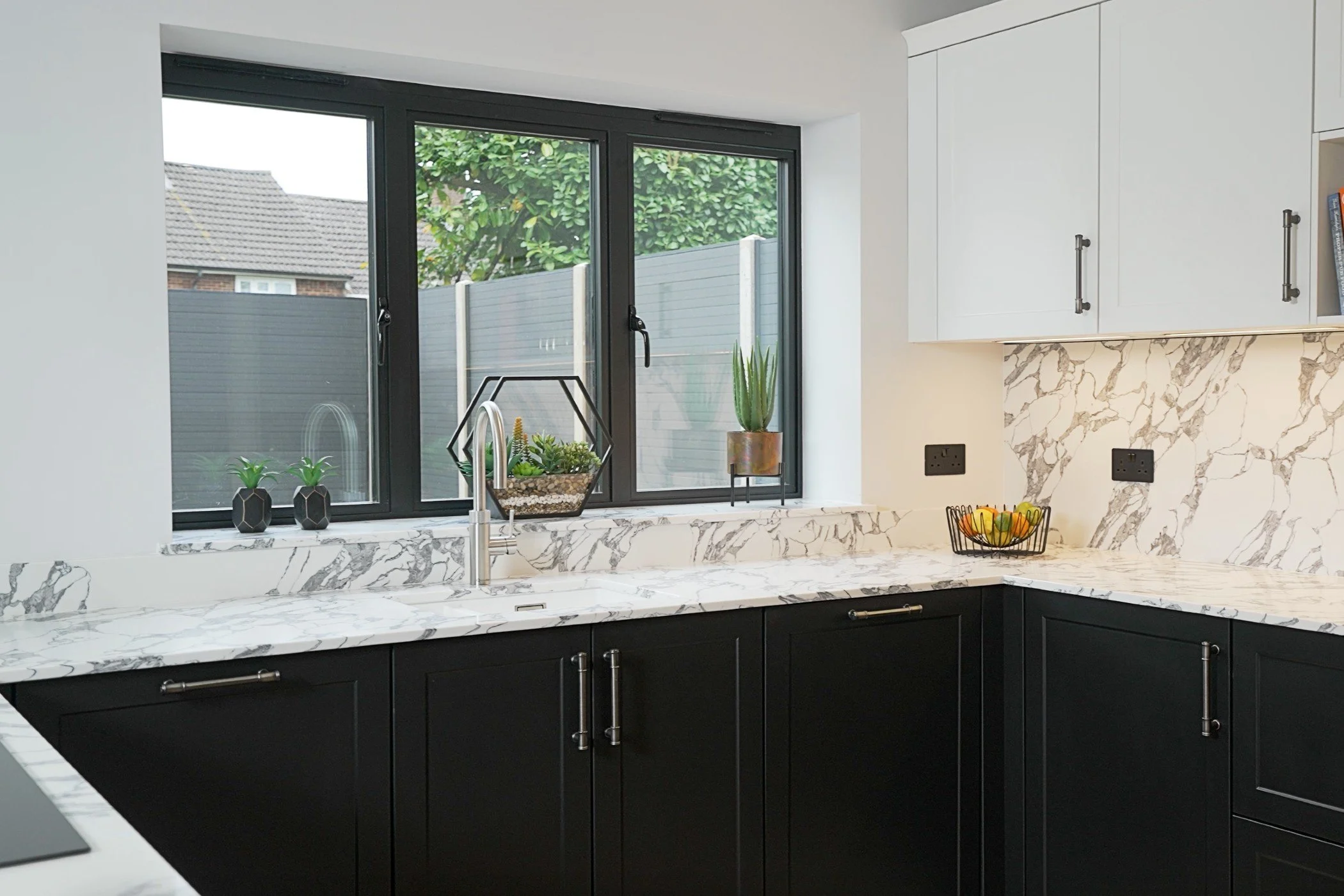 patterned worktop and splashback in kitchen