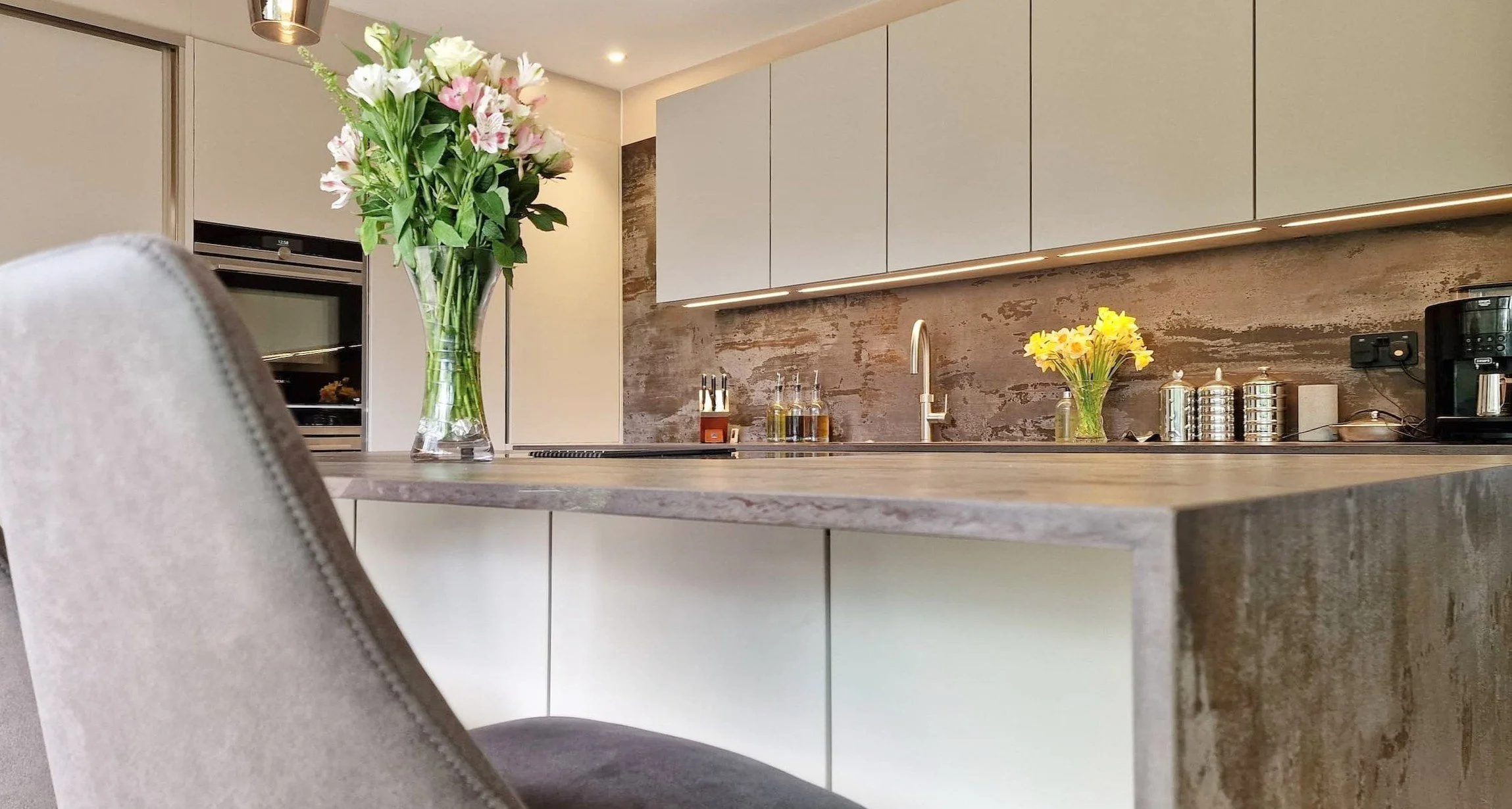 patterned waterfall kitchen worktop and splashback